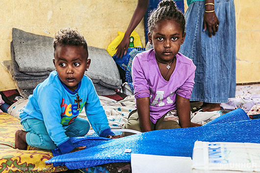 Ethiopia. UNHCR distributes basic relief items to forcibly displaced women and children in Tigray.