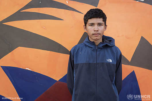 Eduardo, a Venezuelan teenager teenage boy, staring into the camera